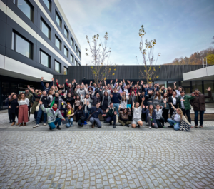 Group image of the Participants of the Young Scientists Symposium 2024 in front of a building