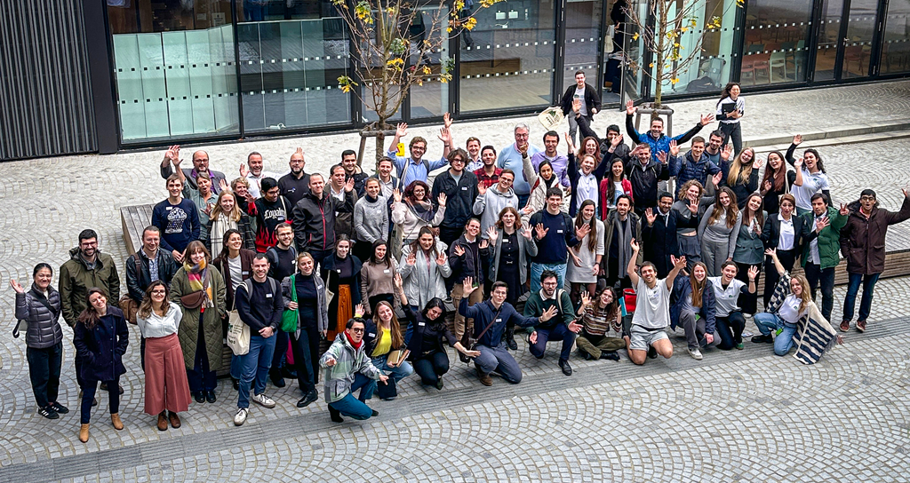 Group image of the Participants of the Young Scientists Symposium 2024 in front of a building at an angle from above