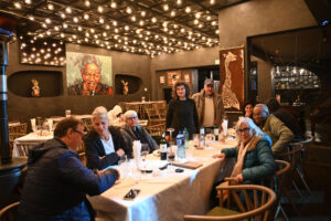 Most of the on site team at dinner in a lovely restaurant