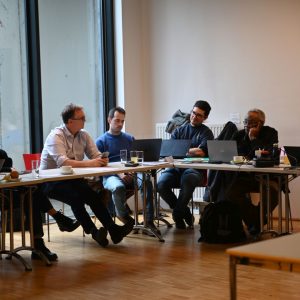 Members from MUW and UJ talking