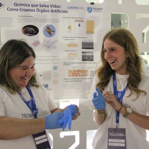 Two team members laughing together